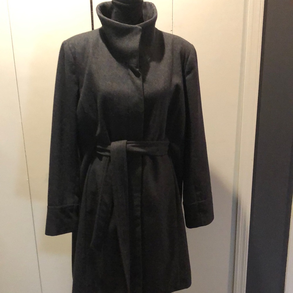 Grey knee length coat with hidden tie belt